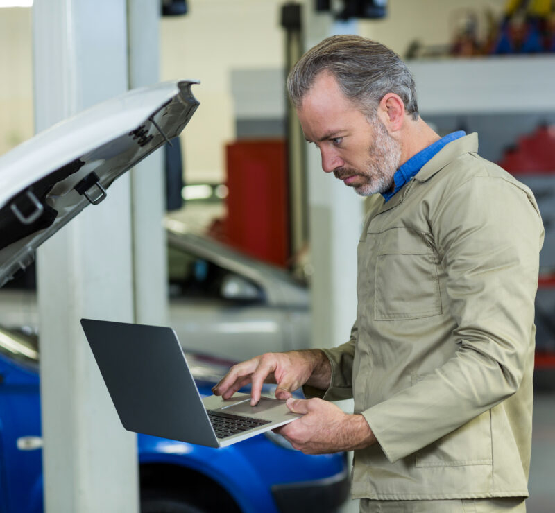 mechanic with laptop